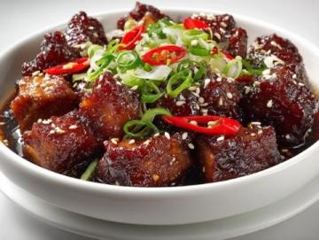 新密地道美食:卷煎與涮牛肚——探尋鄭州傳統(tǒng)風(fēng)味之旅